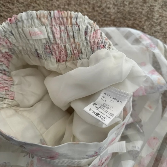 Liz Lisa Pink and white mini skirt with a floral pattern
size XS/Small - Picture 12 of 12